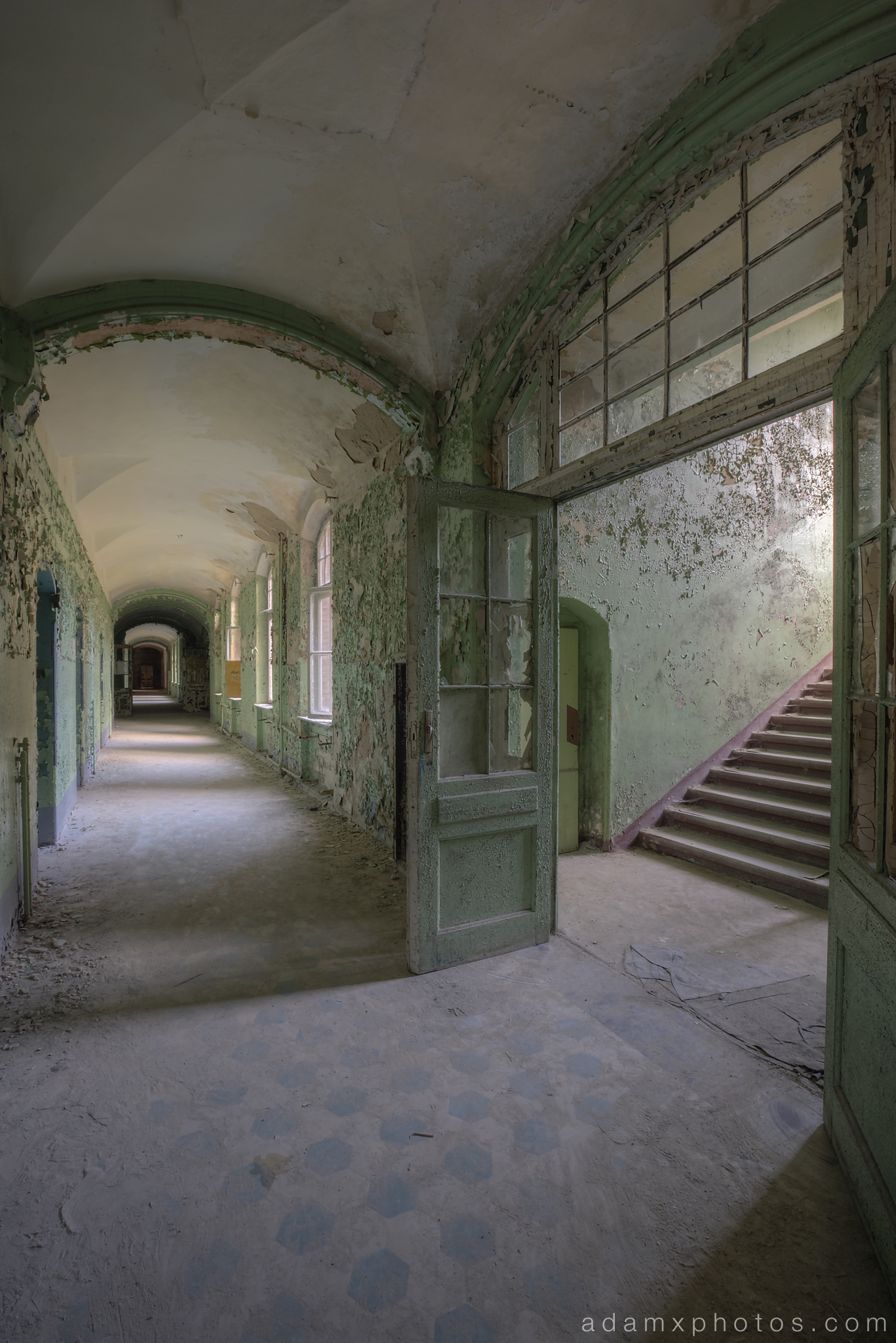 Adam X Urbex Beelitz Heilstatten Germany Urban Exploration Womens Women's Sanatorium Hospital Decay Lost Abandoned Hidden corridor stairs peeling paint peely green